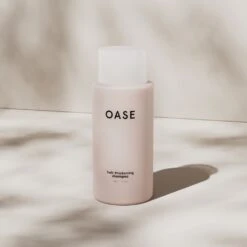 OASE Hair Thickening Shampoo 250ml -Winkel Voor Haarverzorgingsproducten oase hair thickening shampoo 300ml sfeerfoto natuur